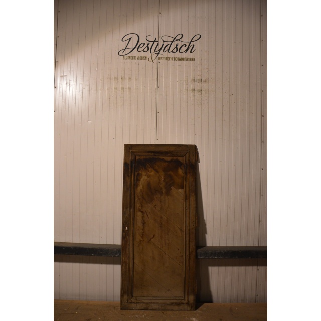 Oude geloogde kastdeur 