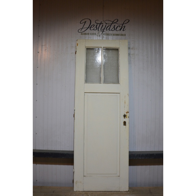 Oude drievaks paneeldeur met glas     