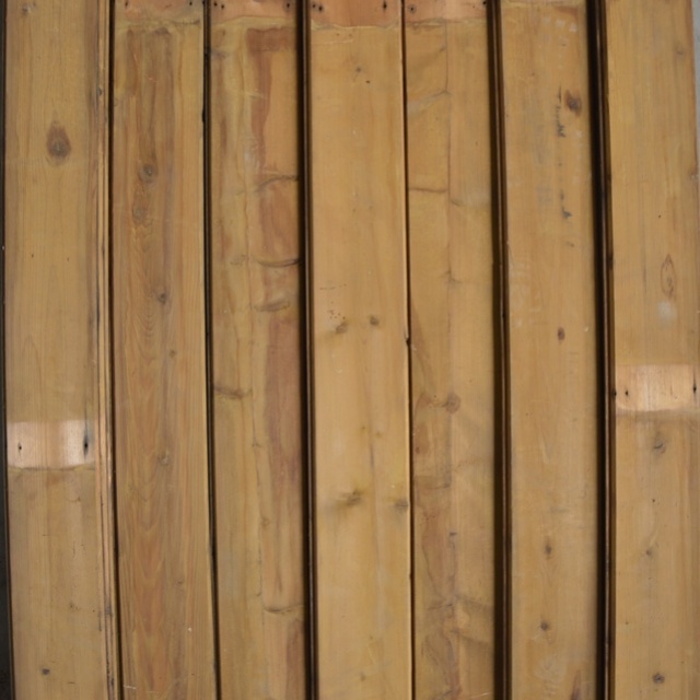 Oude geverfde planken met vellingkant
