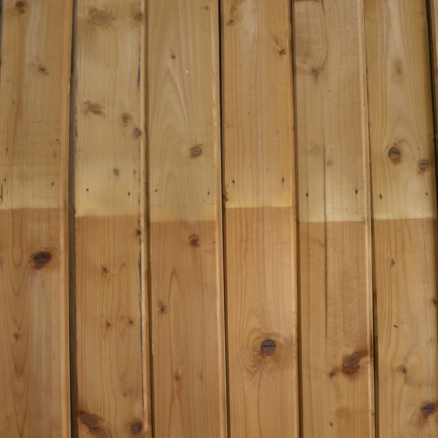 Oude geverfde planken met v-groef