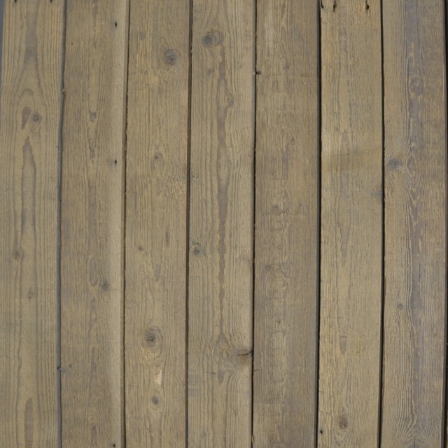 Geborstelde oude grenen planken met breedmes